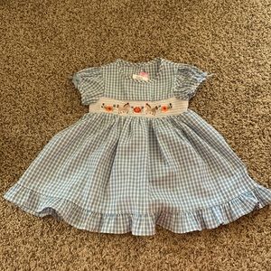 Good lad 18 month blue plaid dress. It has embroidered horses and flowers.